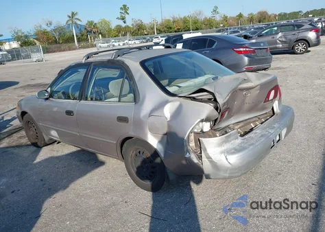 1998 Toyota Corolla Le z USA, uszkodzony, nr VIN 2T1BR18E5WC004581
